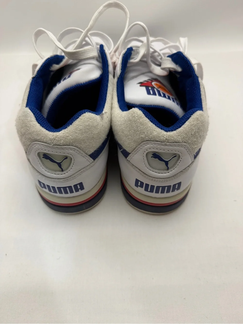 Puma White Athletic Sneakers with Blue and Red Accents